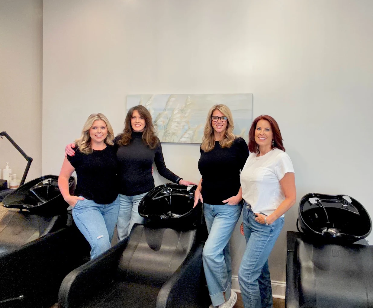 The Studio 4 Salon team of stylists inside Elysian Salon & Spa in Pass Christian, MS